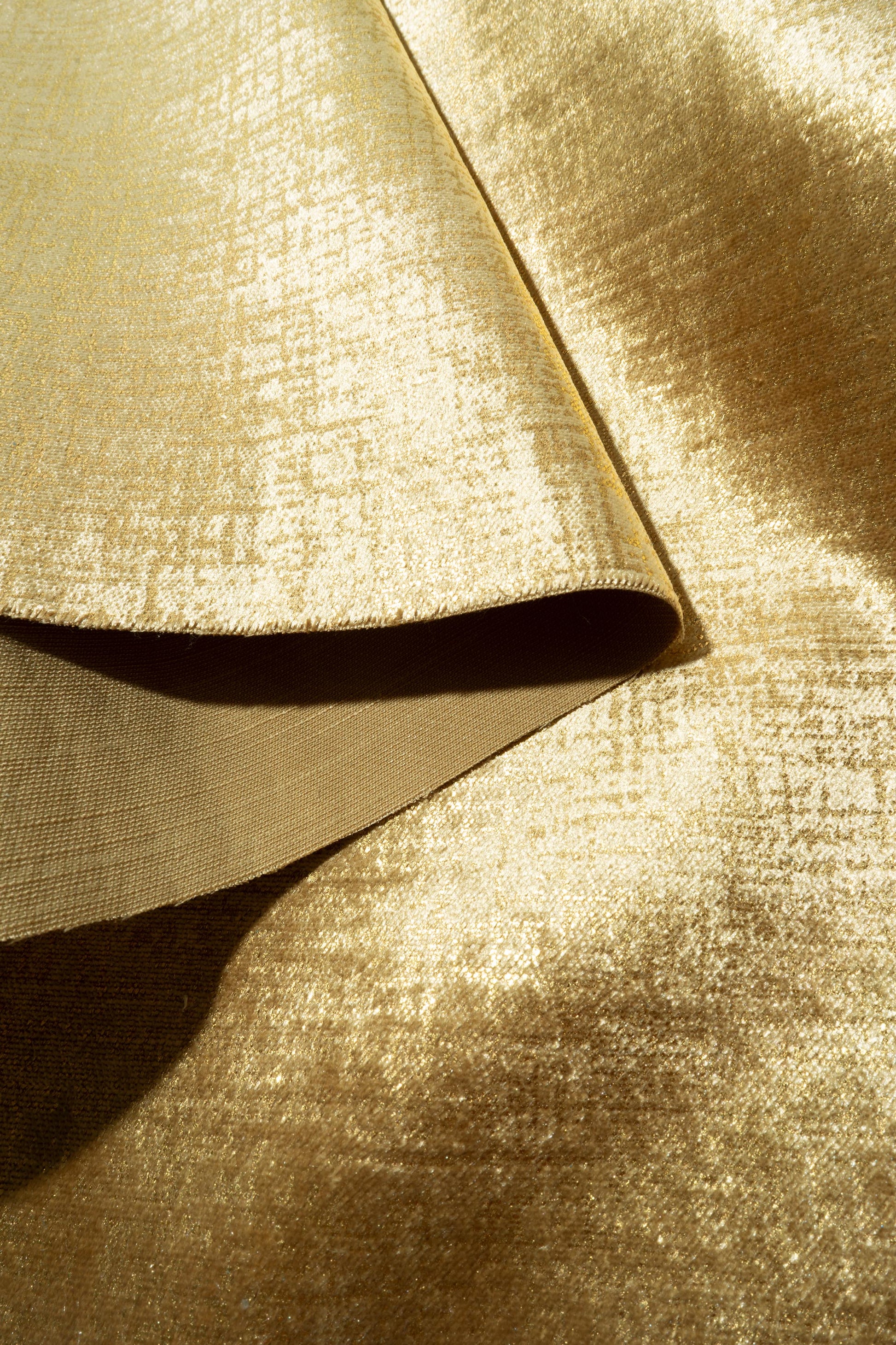 The Awe Velvet Fabric in Glitter Gold || Folded