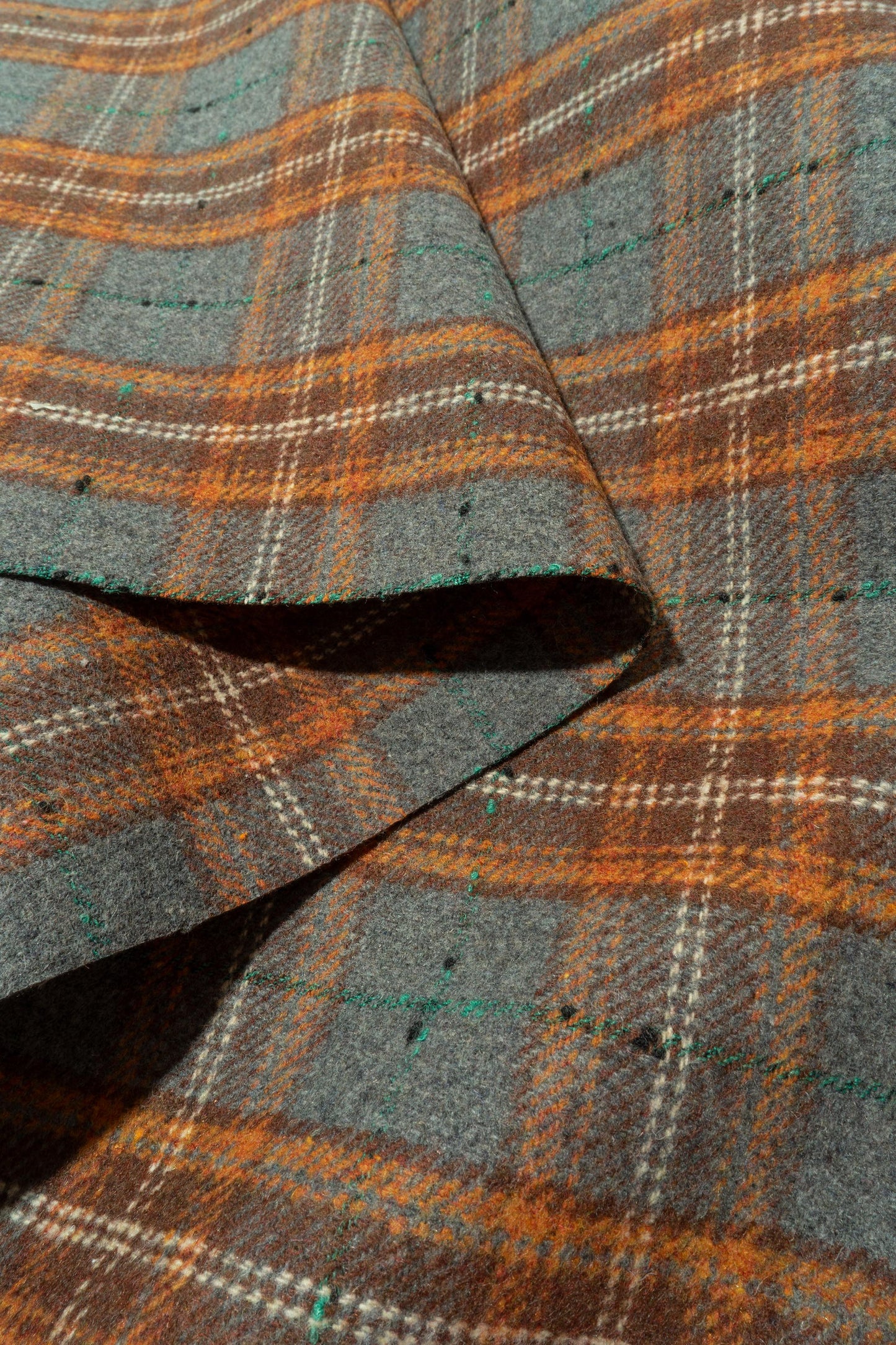 The Barker Plaid Fabric in Claystone || Folded