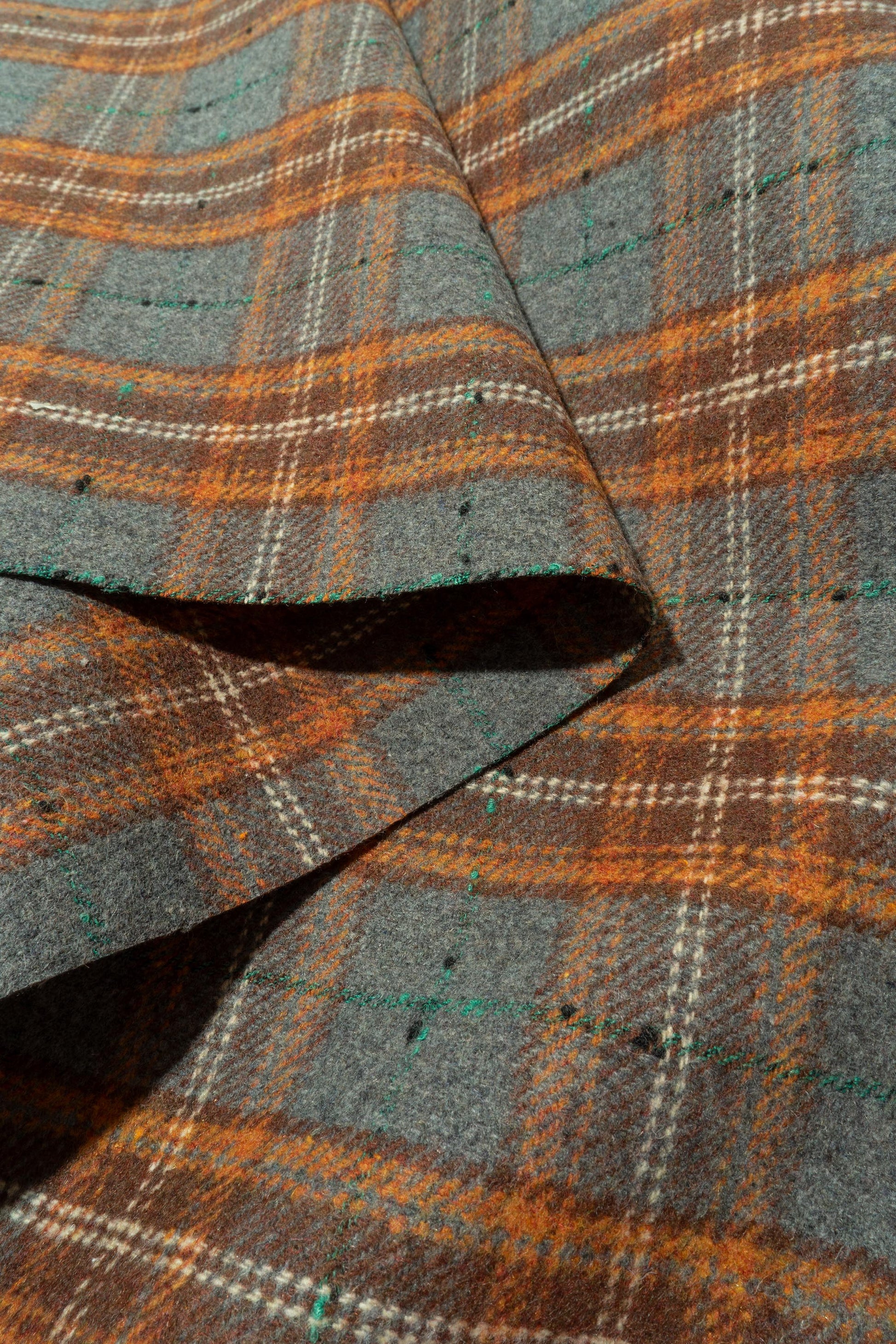 The Barker Plaid Fabric in Claystone || Folded