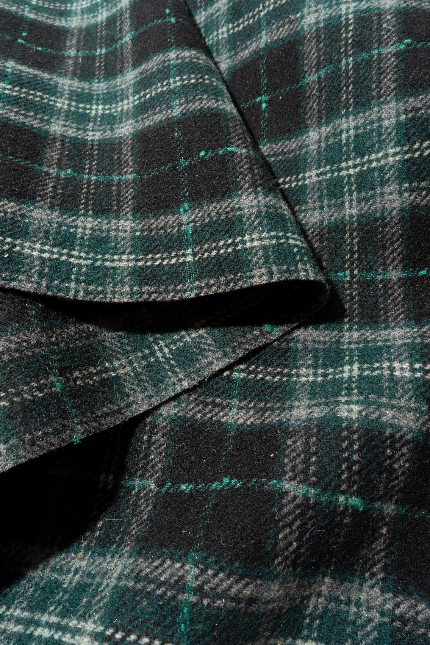 The Barker Plaid Fabric in Navy Green || Folded