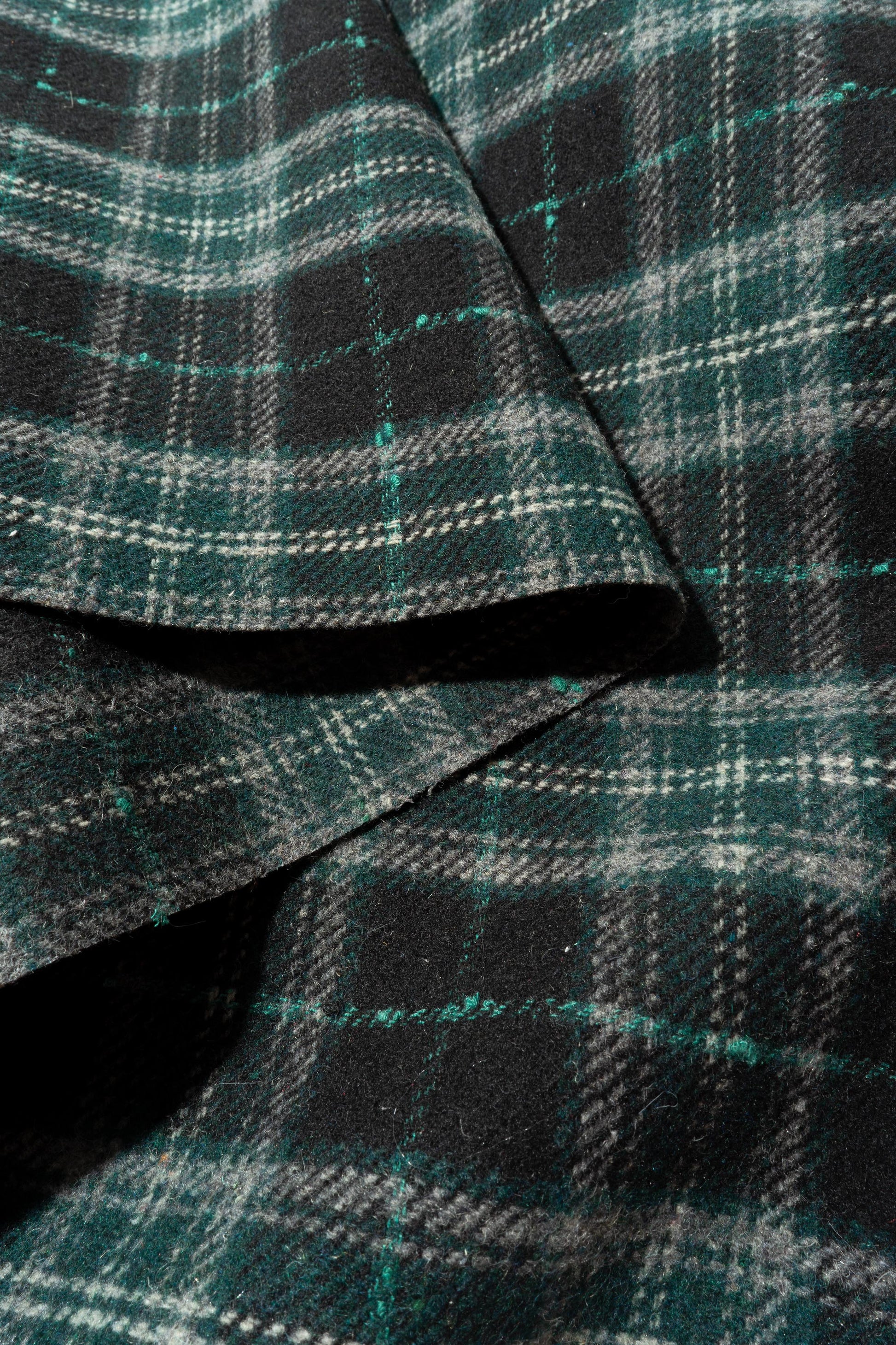 The Barker Plaid Fabric in Navy Green || Folded