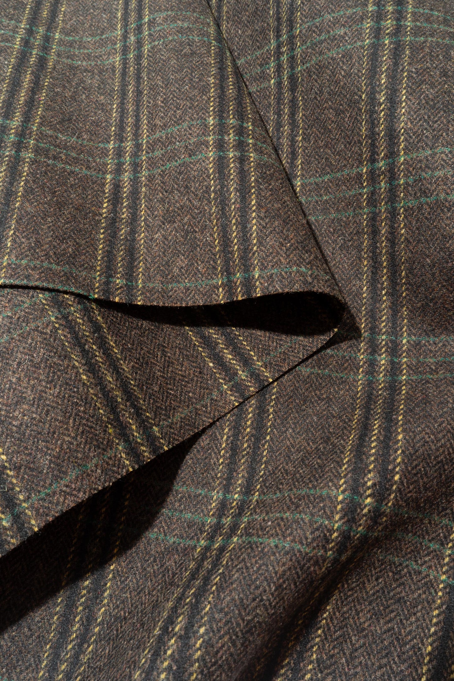 The Glenwood Plaid Fabric in Charbrown || Folded