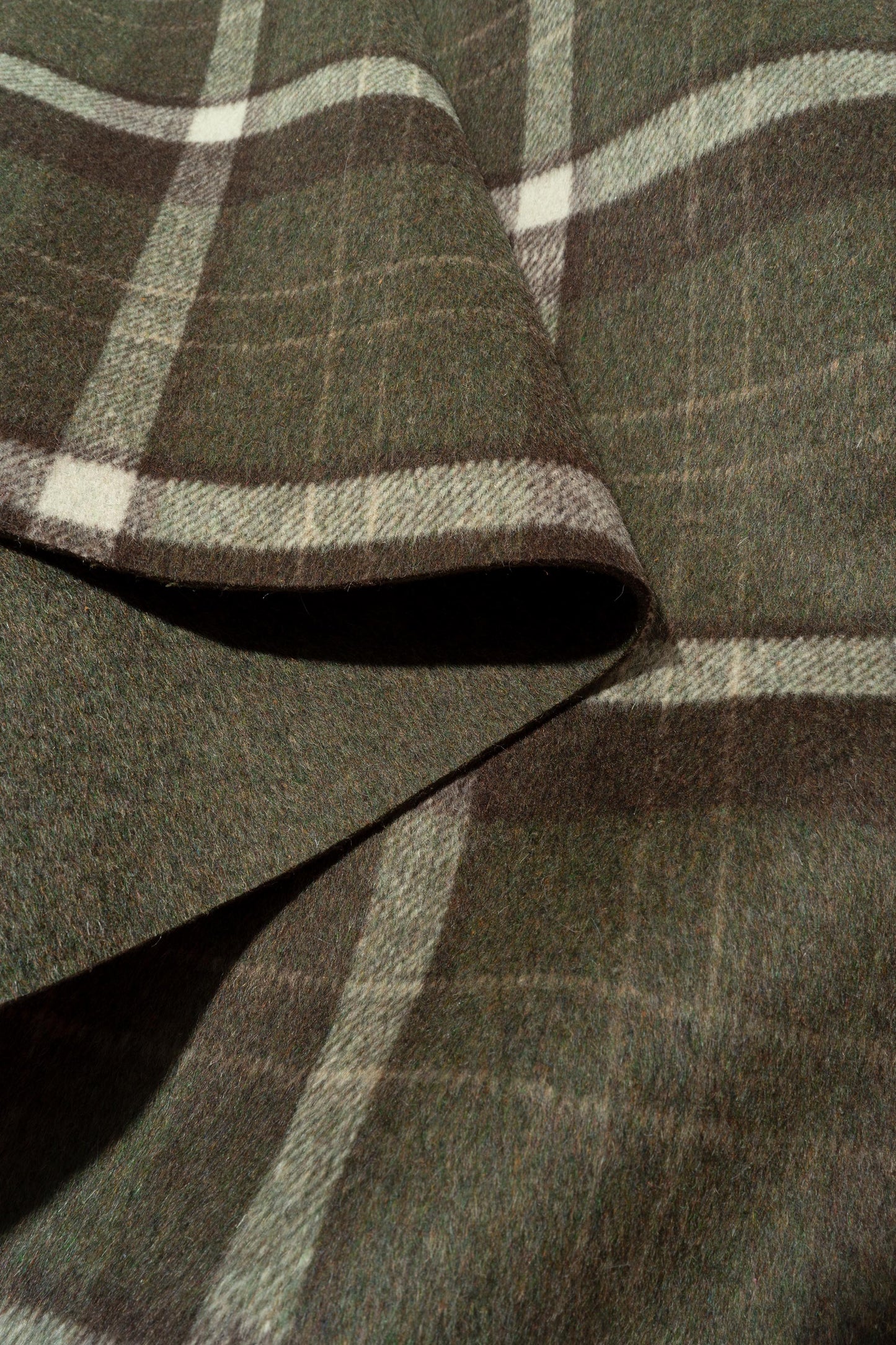 The Hawthorne Plaid Fabric in Forestry || Folded