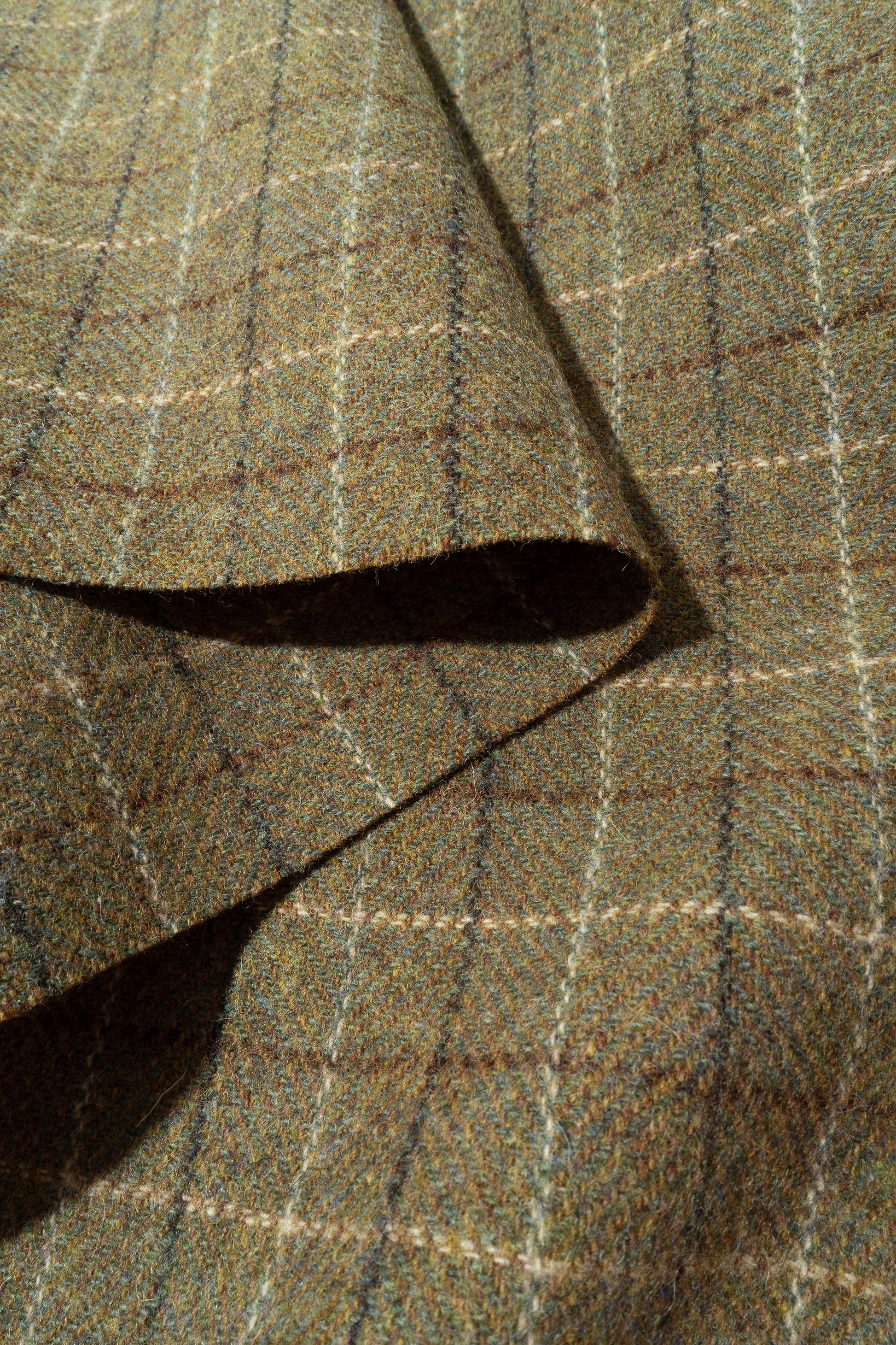 The Pitkin Payne Plaid Fabric in Hickory || Folded