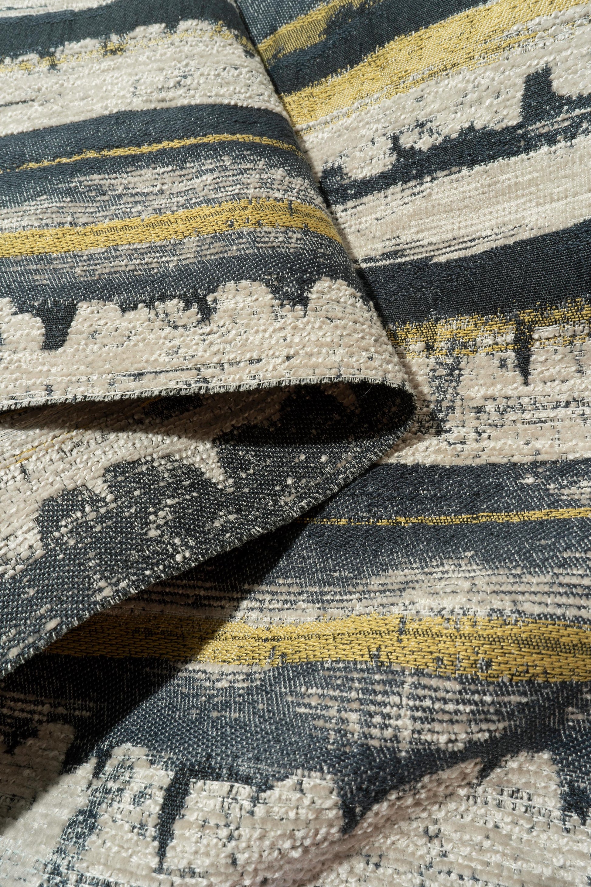The Renzo Fabric in Cast Iron || Folded
