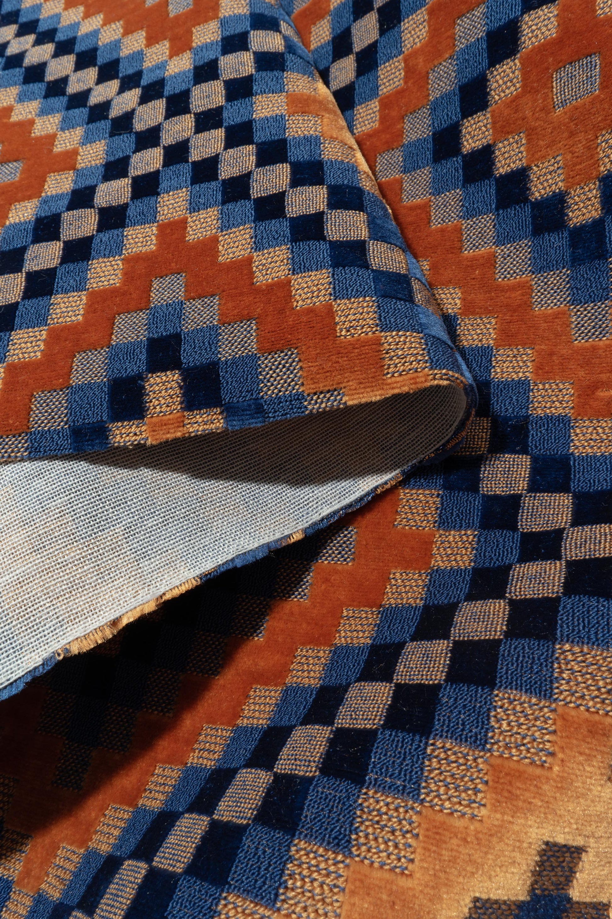 The Throne Velvet Fabric in Bronco || Folded