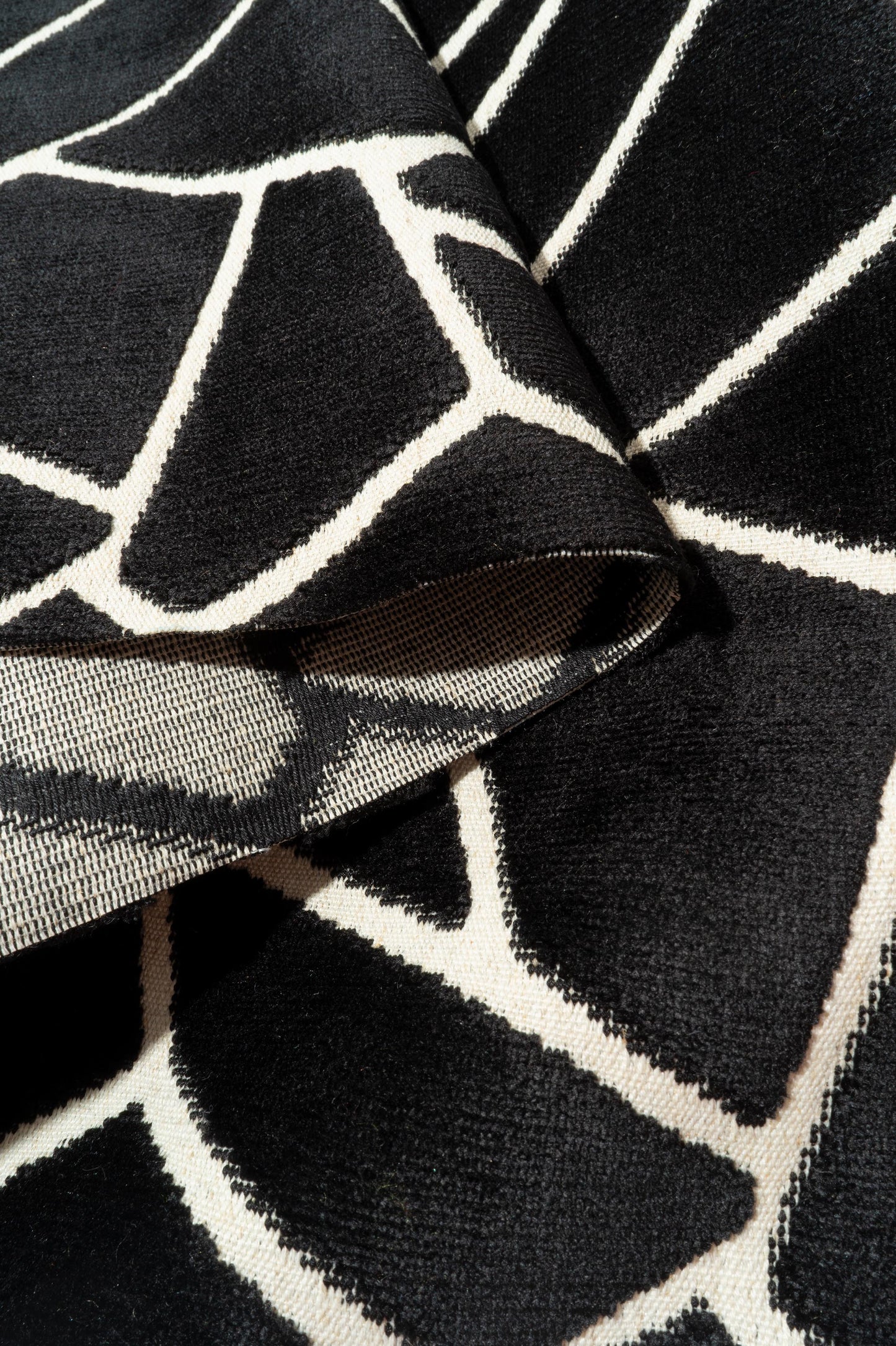 The Venus Fabric in Jet (Allover) || Folded