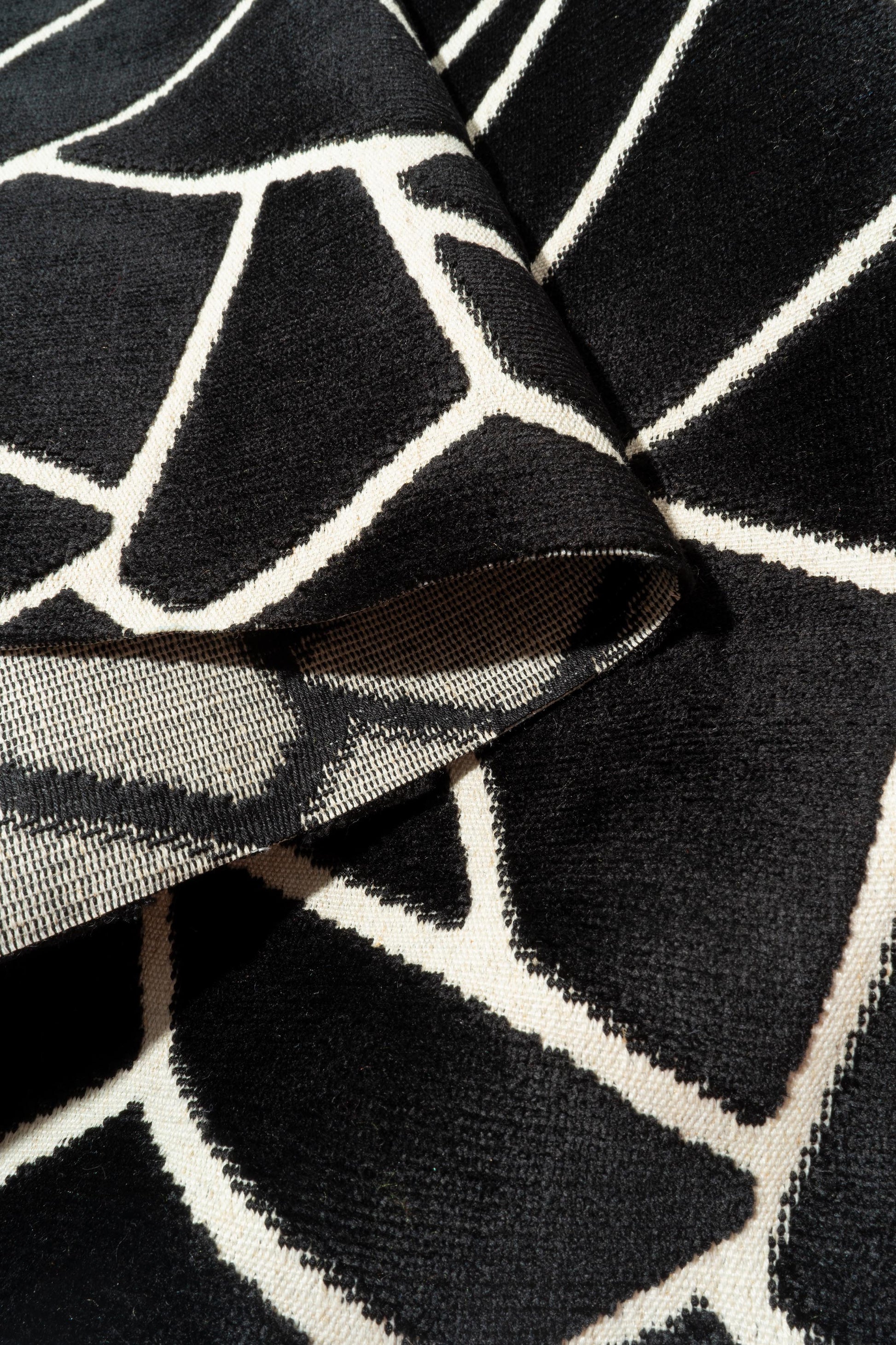 The Venus Fabric in Jet (Allover) || Folded