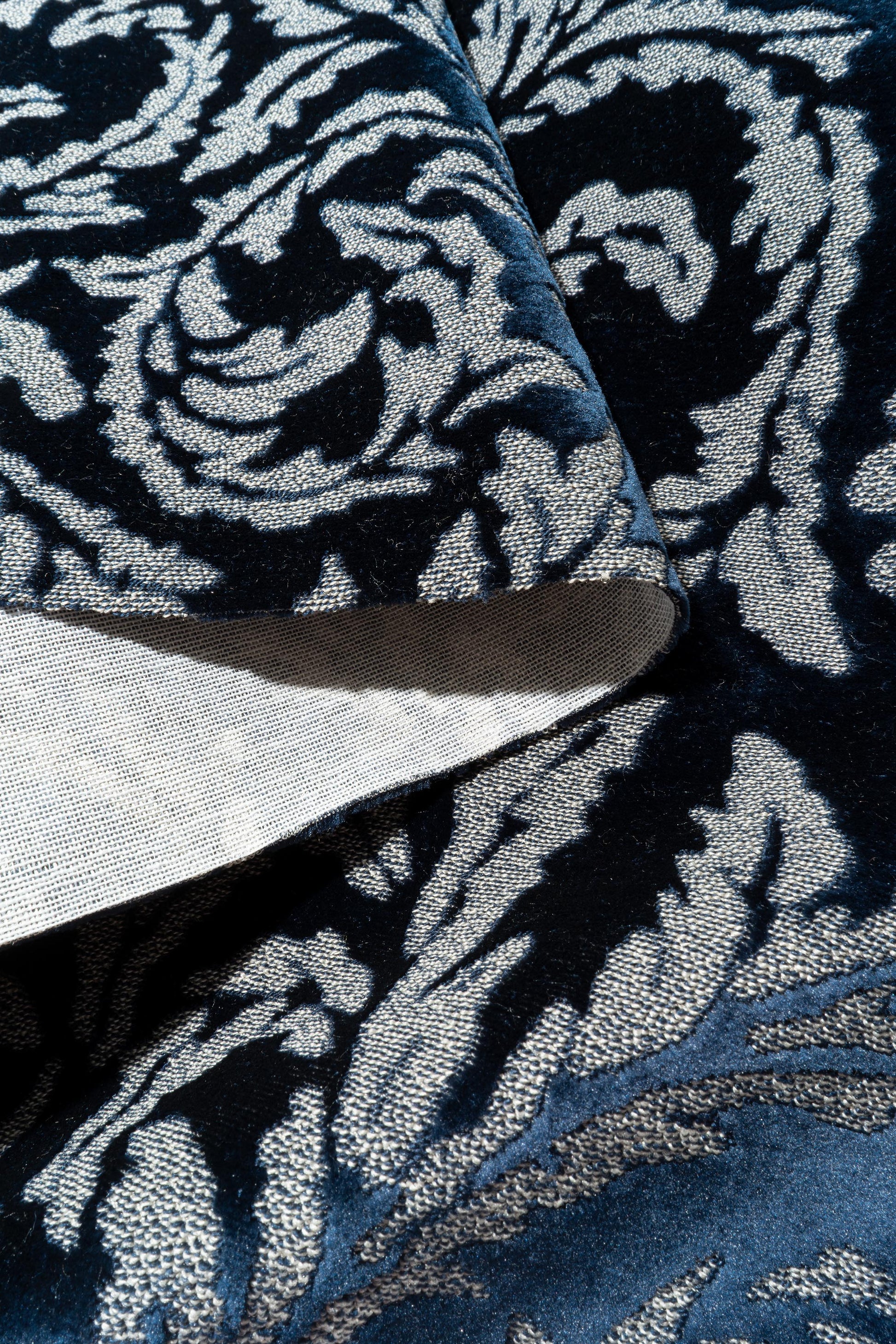 The Westros Velvet Fabric in Moat || Folded